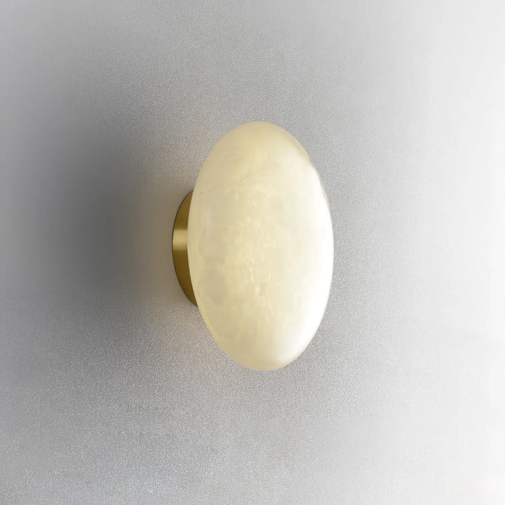 Alabaster luxury oval ceiling lamp side view showcasing elegant design and warm ambient lighting
