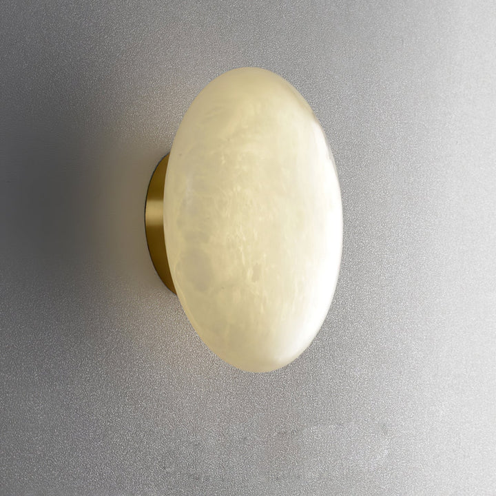 Alabaster luxury oval ceiling lamp side view highlighting elegant design and soft ambient lighting