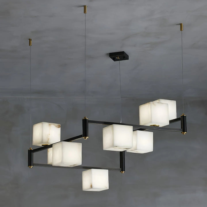 Close-up view of alabaster marble square box chandelier, modern elegant ceiling fixture for home décor