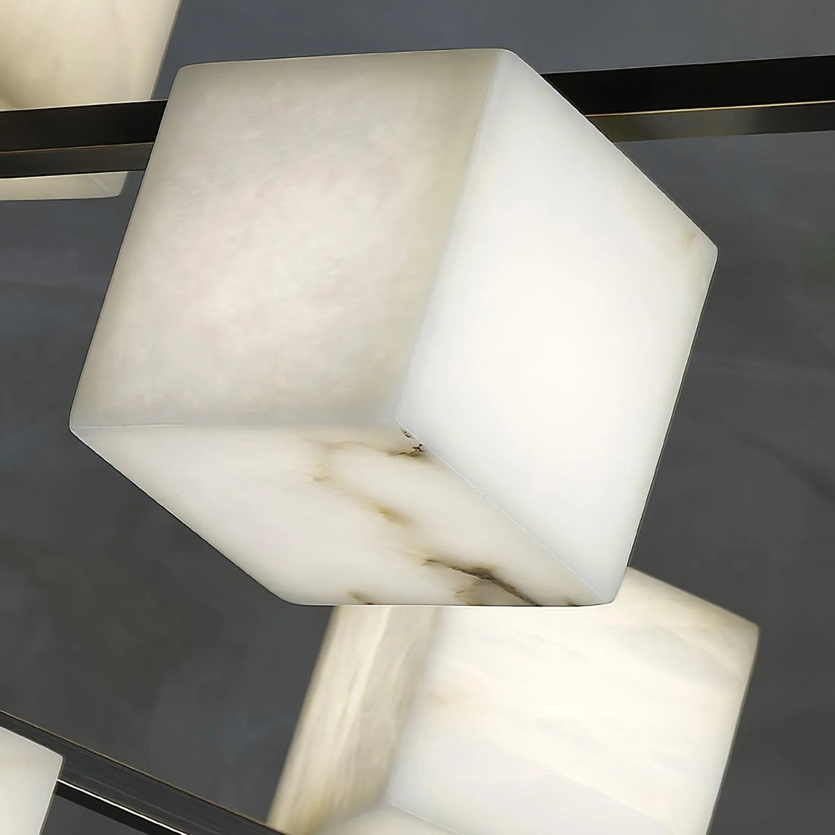 Detail view of alabaster marble square box chandelier, modern elegant ceiling fixture for home décor