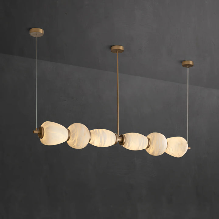 Alabaster Pebble linear chandelier luxury lighting displaying a side view for elegant contemporary interiors