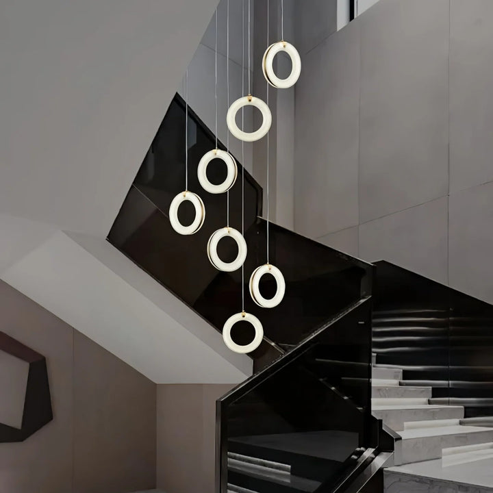 Alabaster ring pendant light, modern design, stairside hanging view