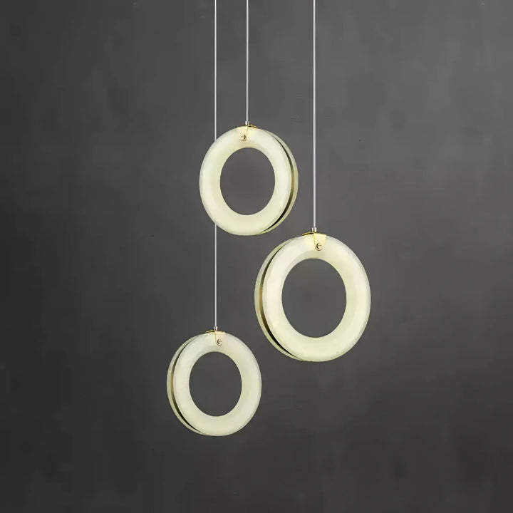 Three alabaster ring pendant lights, modern design, hanging view
