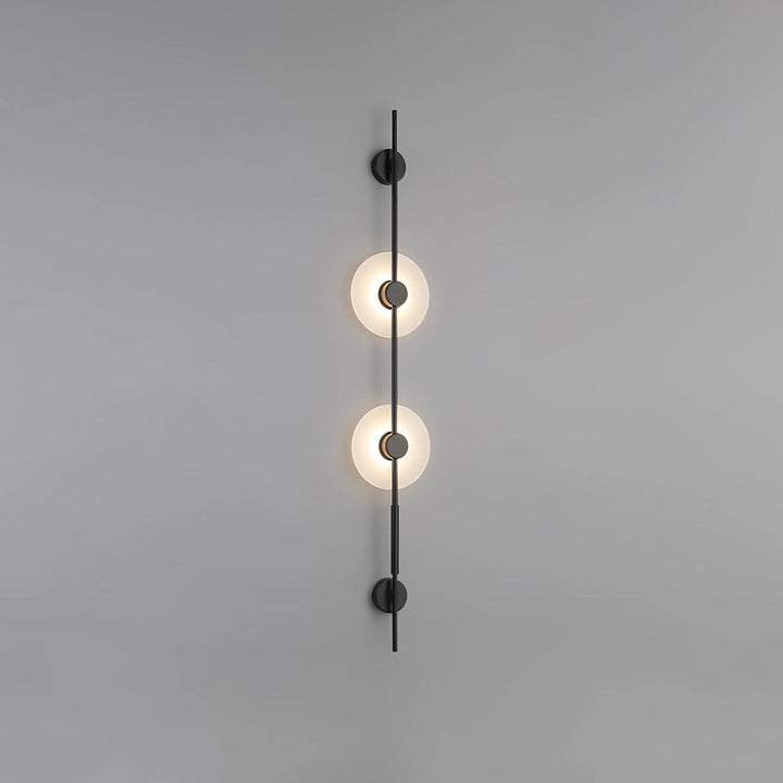 Front view of Alabaster Vertical Plug-In Wall Sconce, modern lighting with black finish, elegant décor