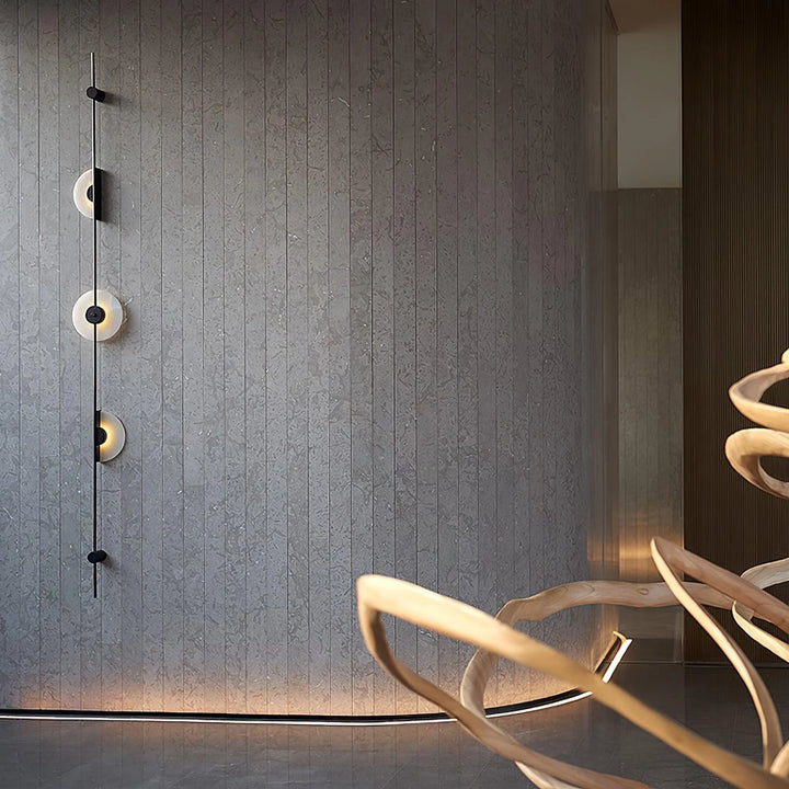 Alabaster Vertical Plug-In Wall Sconce on living room wall, modern lighting, elegant interior décor