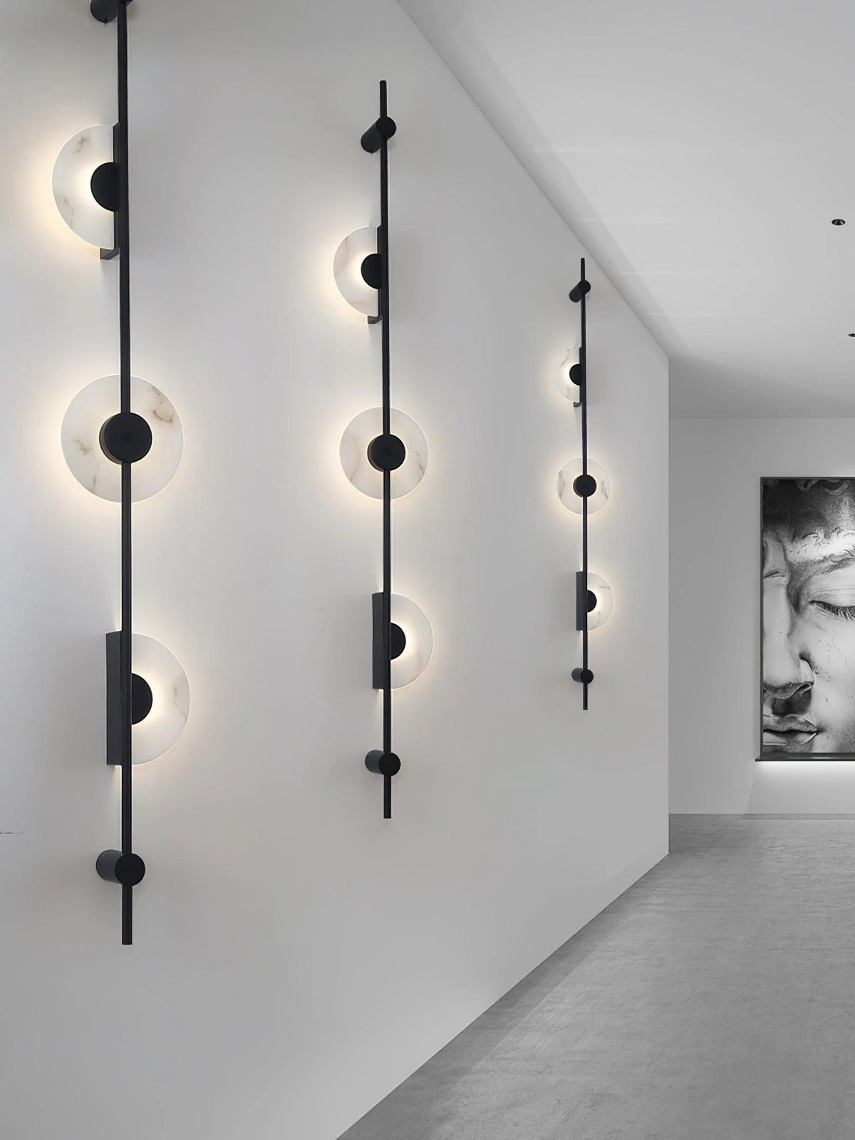 Front view of Alabaster Vertical Plug-In Wall Sconce on wall, modern lighting, elegant interior décor