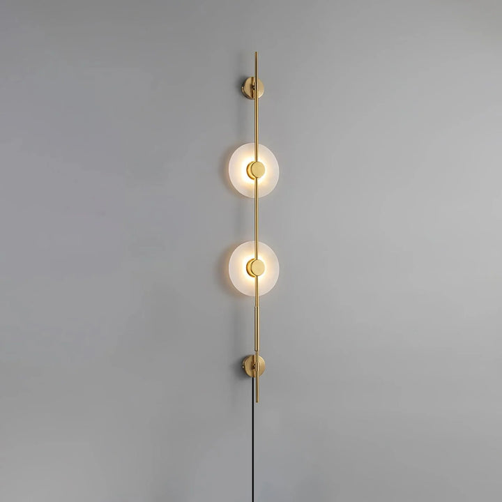 Side view of Alabaster Vertical Plug-In Wall Sconce, modern lighting with golden finish, elegant décor