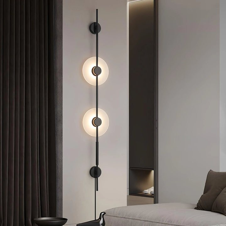 Side view of Alabaster Vertical Plug-In Wall Sconce in room, modern lighting, elegant home décor
