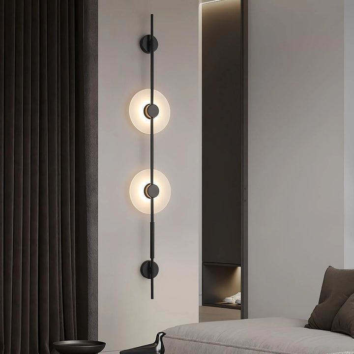 Alabaster vertical wall sconce in living room – modern elegant lighting for stylish interiors