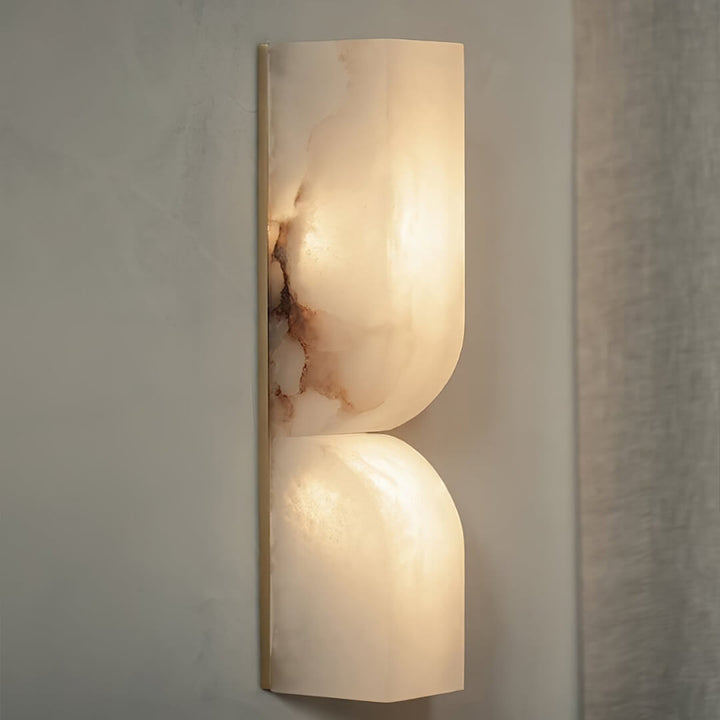 Modern alabaster wall light sconce – sleek design with smooth natural stone finish for elegant ambient lighting.