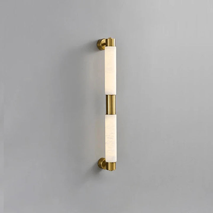 Alatar alabaster modern wall light angle view with gold finish highlighting elegant contemporary design