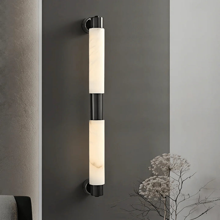 Alatar alabaster modern wall light front view with black finish featuring sleek contemporary design and soft ambient glow