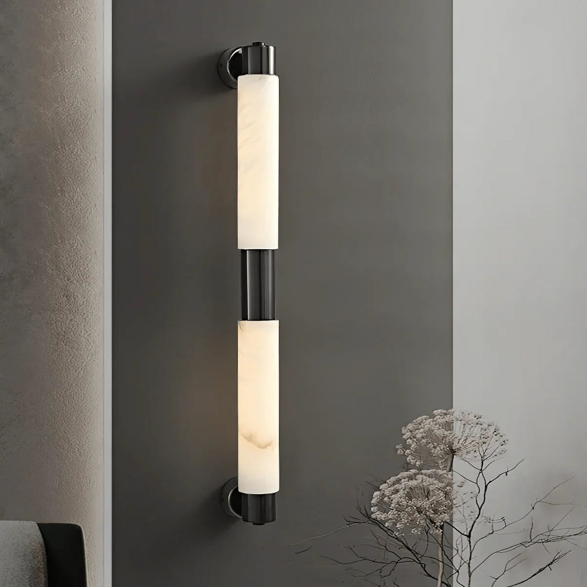 Alatar alabaster modern wall light front view with black finish featuring sleek contemporary design and soft ambient glow