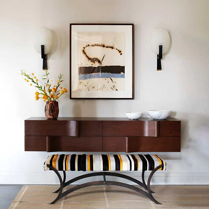 Alice alabaster modern plug-in wall light front view in living room showcasing elegant design