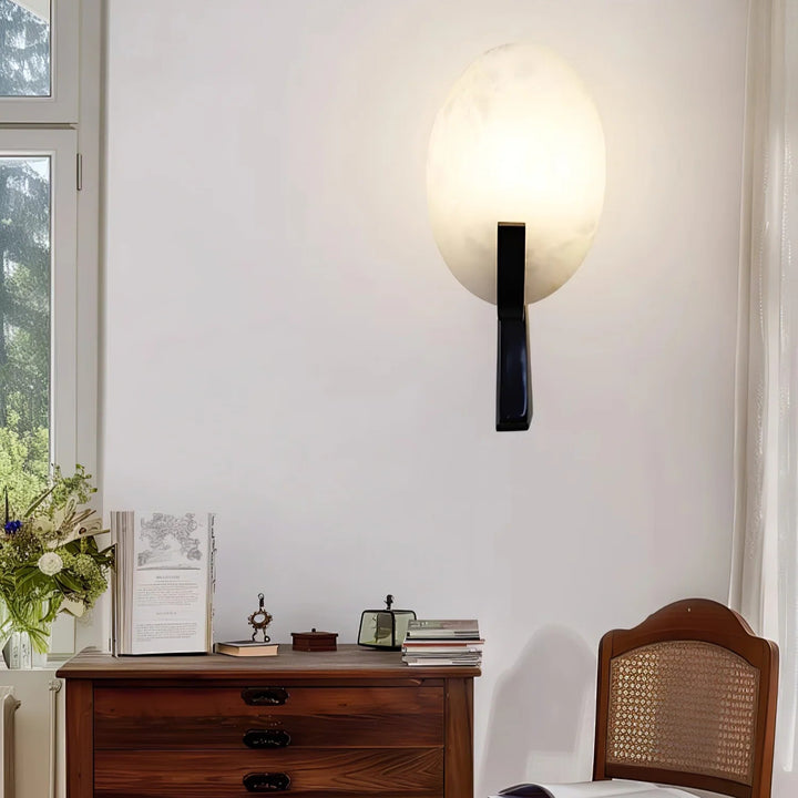 Alice alabaster modern plug-in wall light front view showcasing sleek and elegant contemporary design