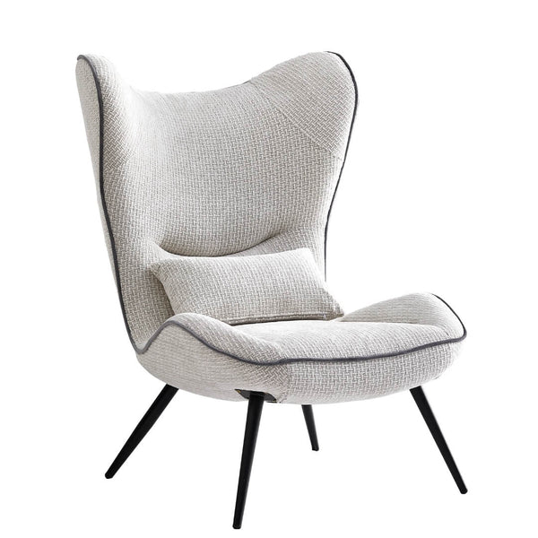  Front view of AltaWing custom wingback lounge chair with textured upholstery and contrast piping