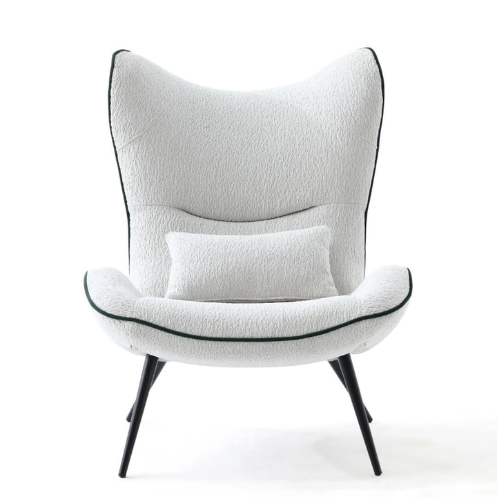  Front view of AltaWing custom wingback lounge chair with textured upholstery and contrast piping