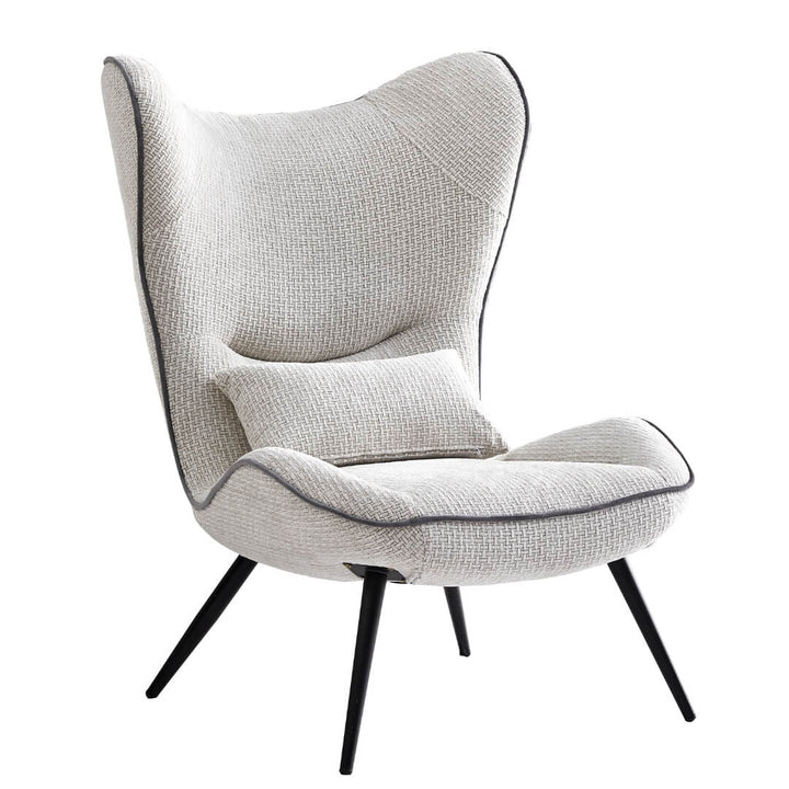  Front view of AltaWing custom wingback lounge chair with textured upholstery and contrast piping