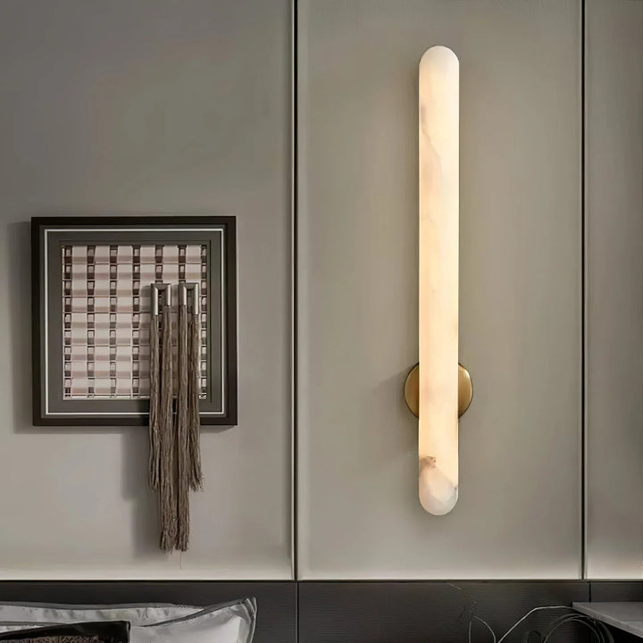 Alunari modern wall sconce light bedside view, elegant contemporary design for stylish bedroom and home interiors
