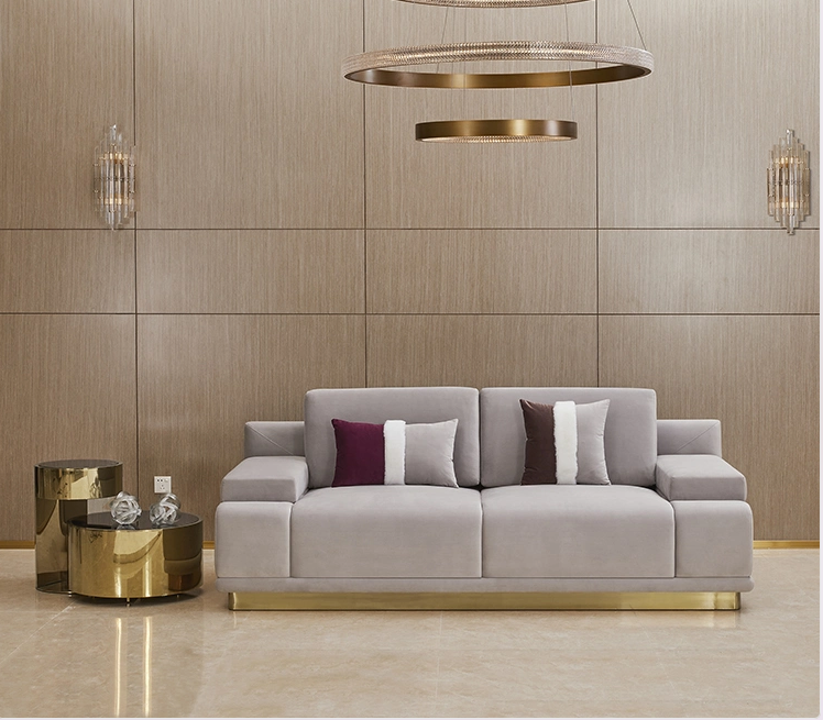 Amber three-seater sofa with plush cushions and modern design, styled in a cozy living room setting