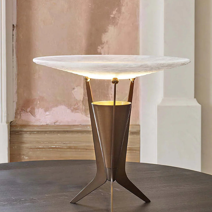 Aragon table lamp on living room table, modern design providing warm ambient lighting for interiors