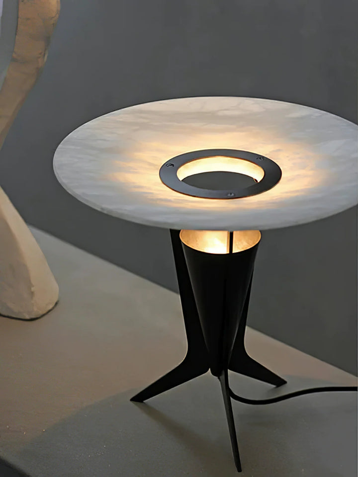 Front view of Aragon table lamp, showcasing modern design with warm ambient lighting for stylish interiors