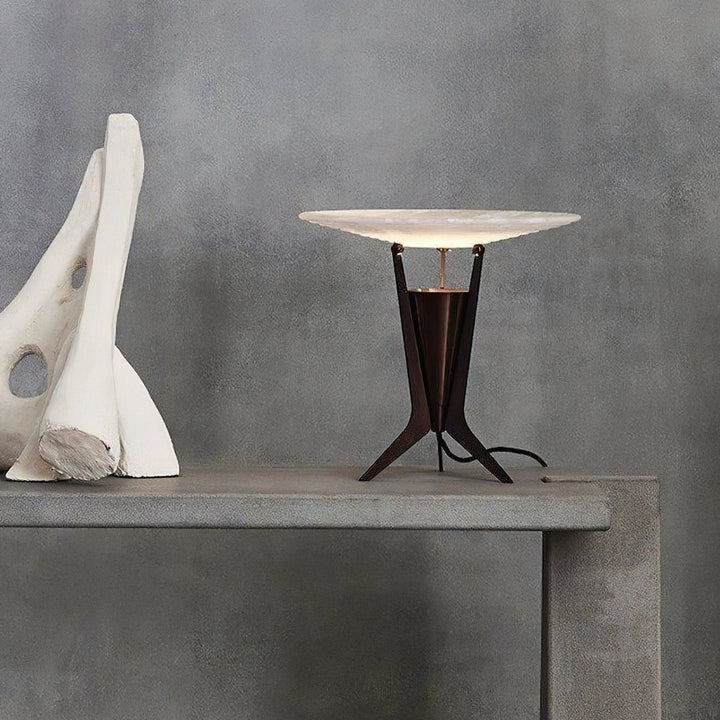 Front view of Aragon table lamp, showcasing modern design with warm ambient lighting for interiors