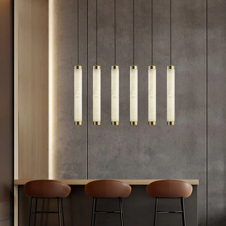 Aria pendant lamp modern lighting hanging over a dining room for stylish contemporary decor