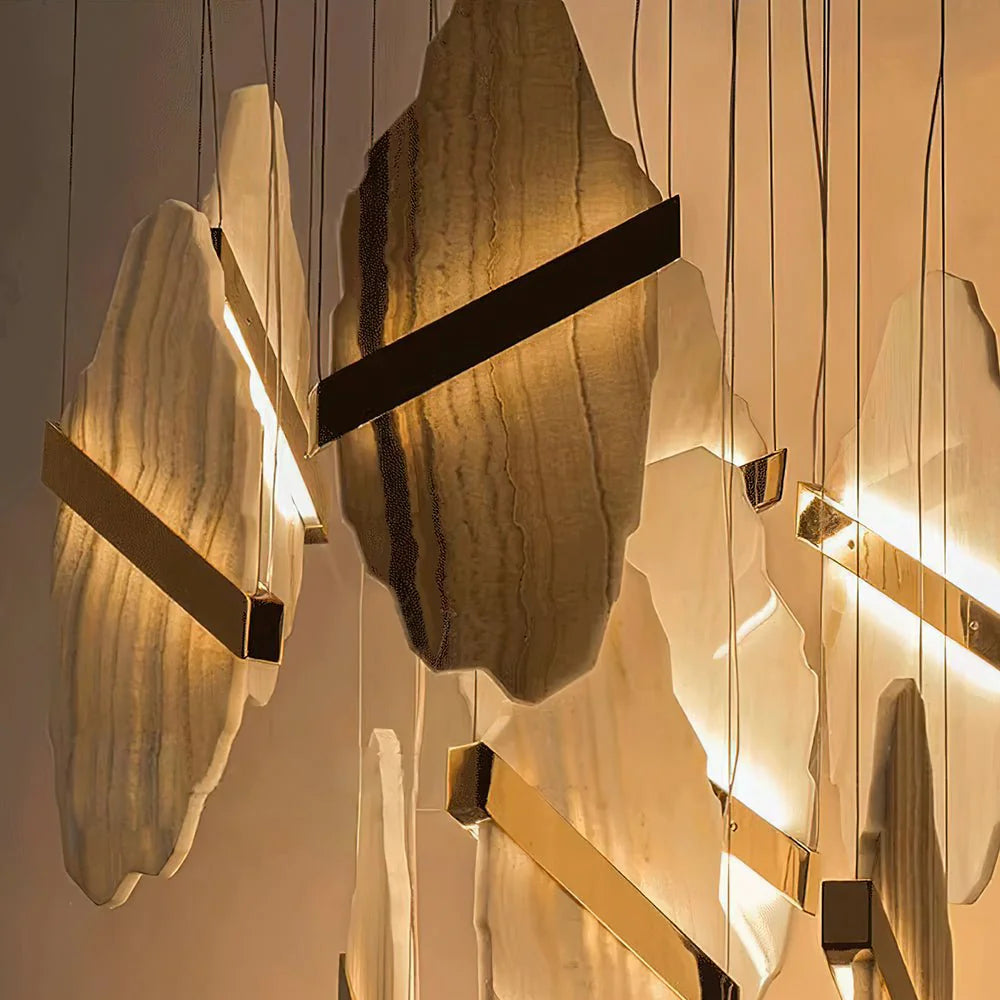Auralith chandelier detailed view showing marble accents and crystal design, luxurious modern lighting