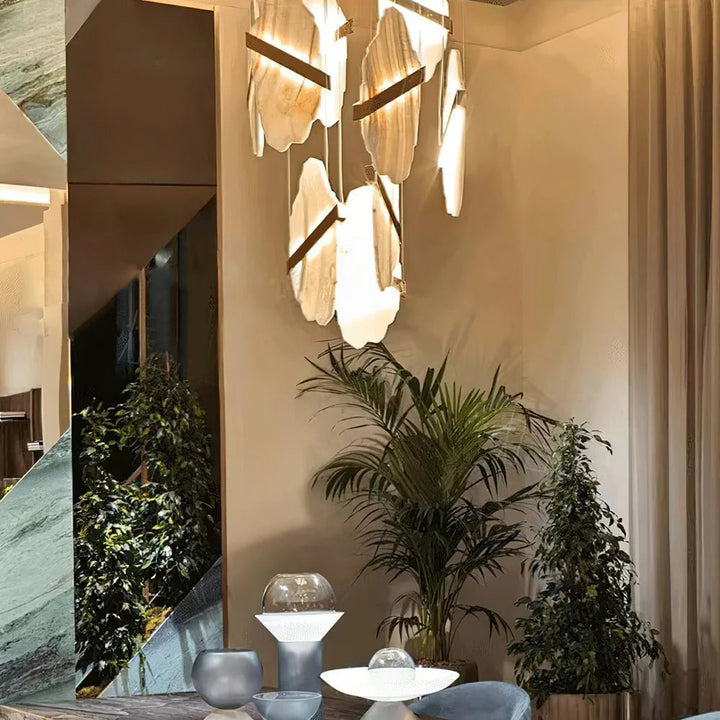 Auralith chandelier side view showcasing marble accents and multi-tier crystal design, luxurious lighting