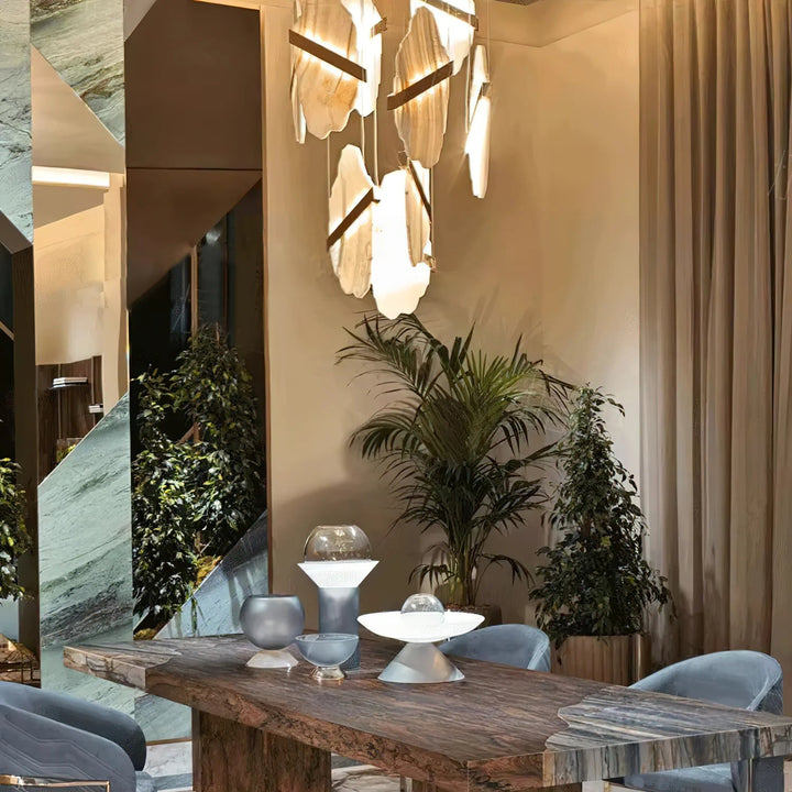 Auralith chandelier hanging view showing marble accents and multi-tier crystal design, luxurious lighting