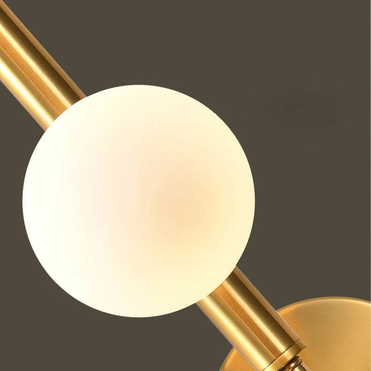 Aurora Trio Globe Wall Sconce light G9 bulb close view, modern metal and glass fixture design
