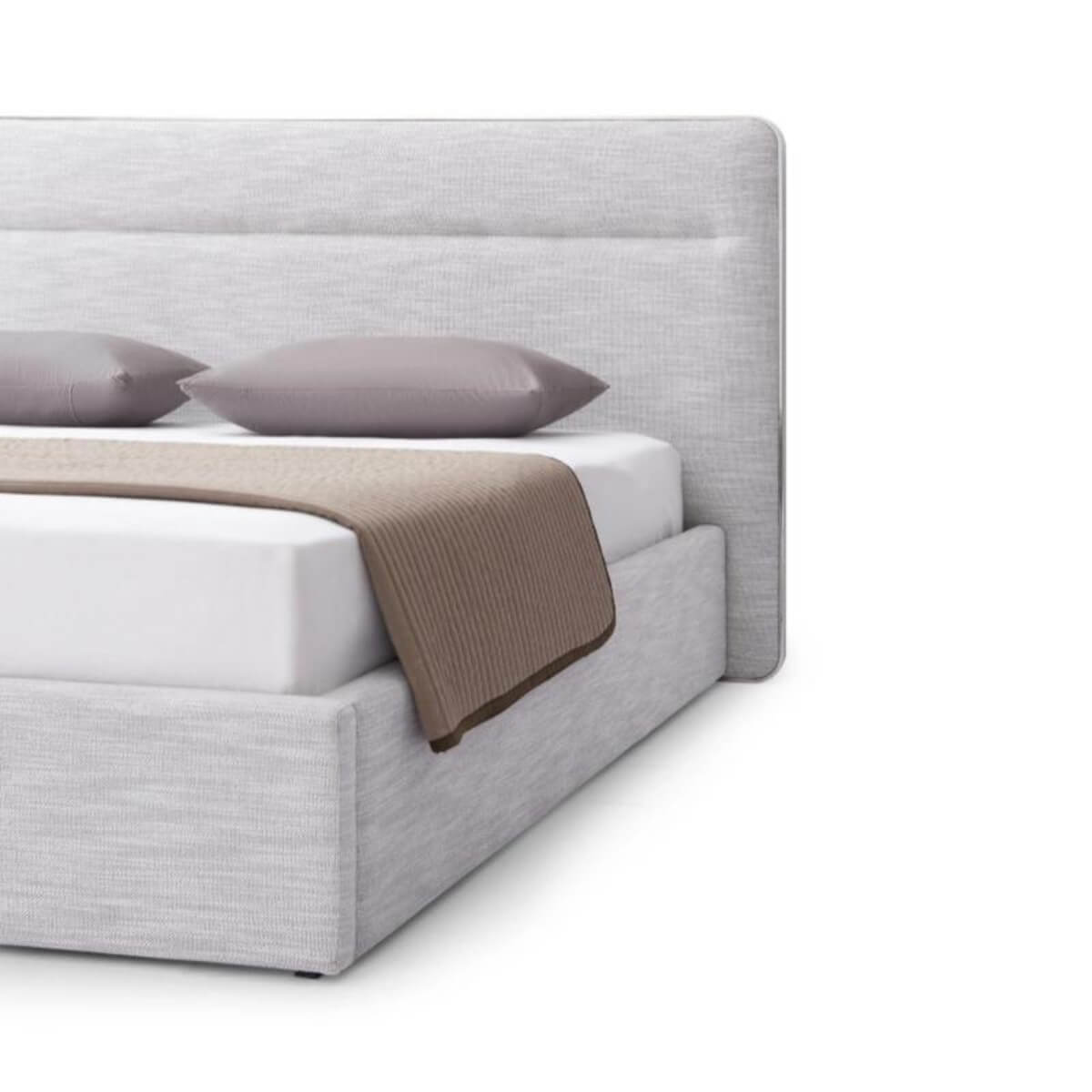 Side-front view of bespoke KB36 1.8M bed with plush velvet upholstery and sleek tufted headboard design