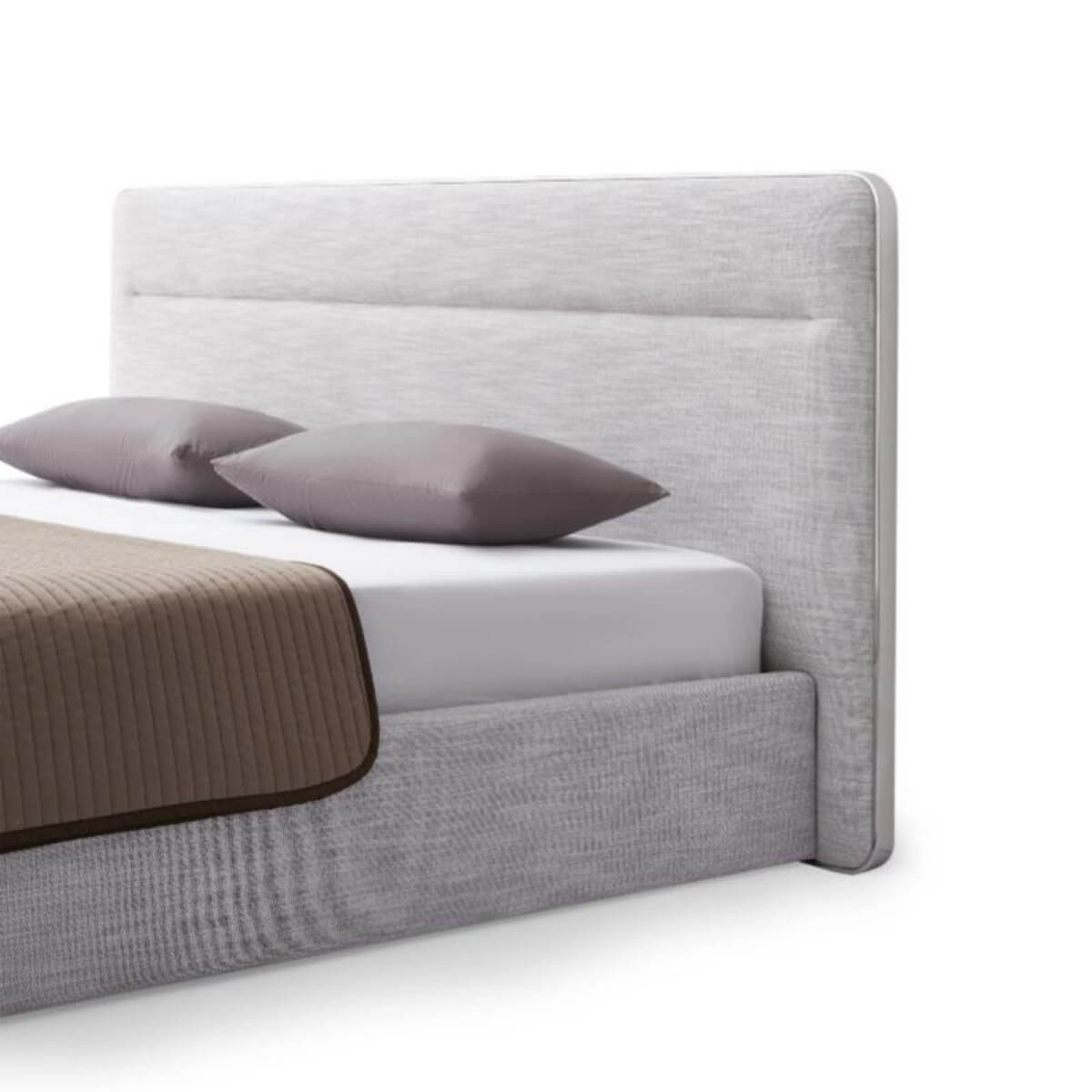 Close-up side view of bespoke KB36 1.8M bed highlighting tufted velvet upholstery and fine craftsmanship