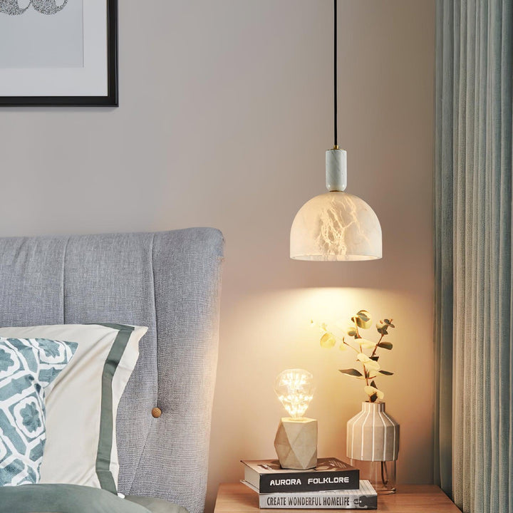 Blair alabaster pendant light in a modern bedside setting for soft elegant bedroom lighting