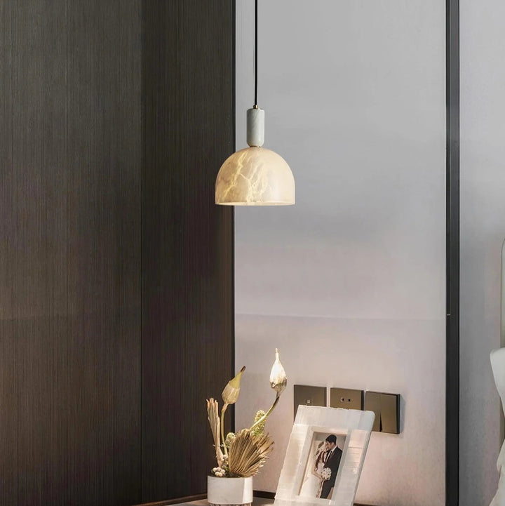 Blair alabaster pendant light in a modern living room setting for elegant ambient lighting
