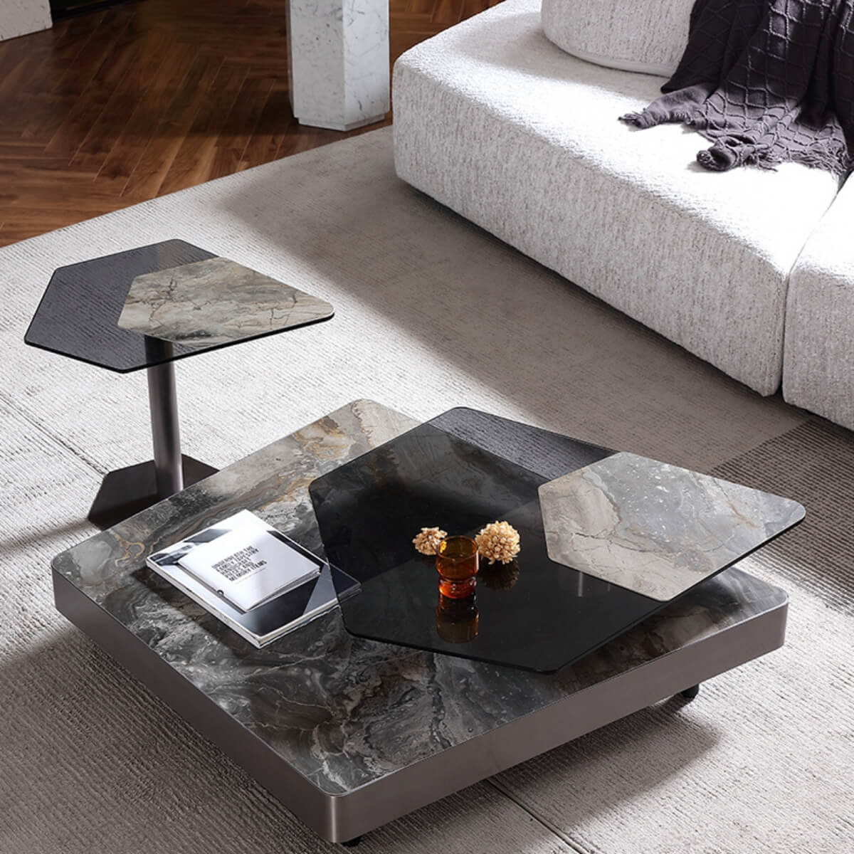 Angled view of Blanco coffee table with marble top and toughened glass, highlighting modern elegance