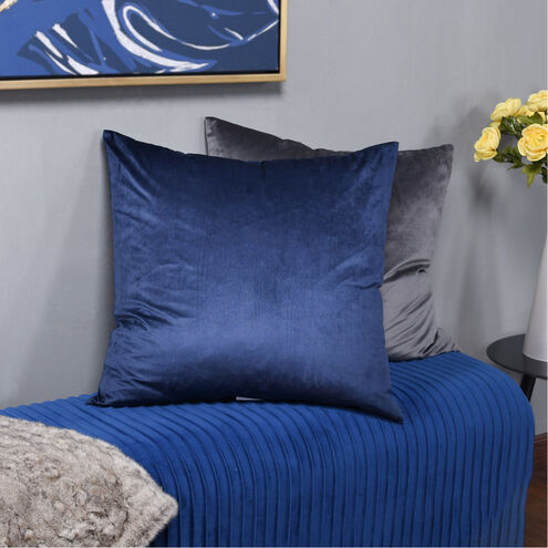 Blue velvet Dreamy Delight cushion on sofa, adding plush comfort and elegance to living room decor