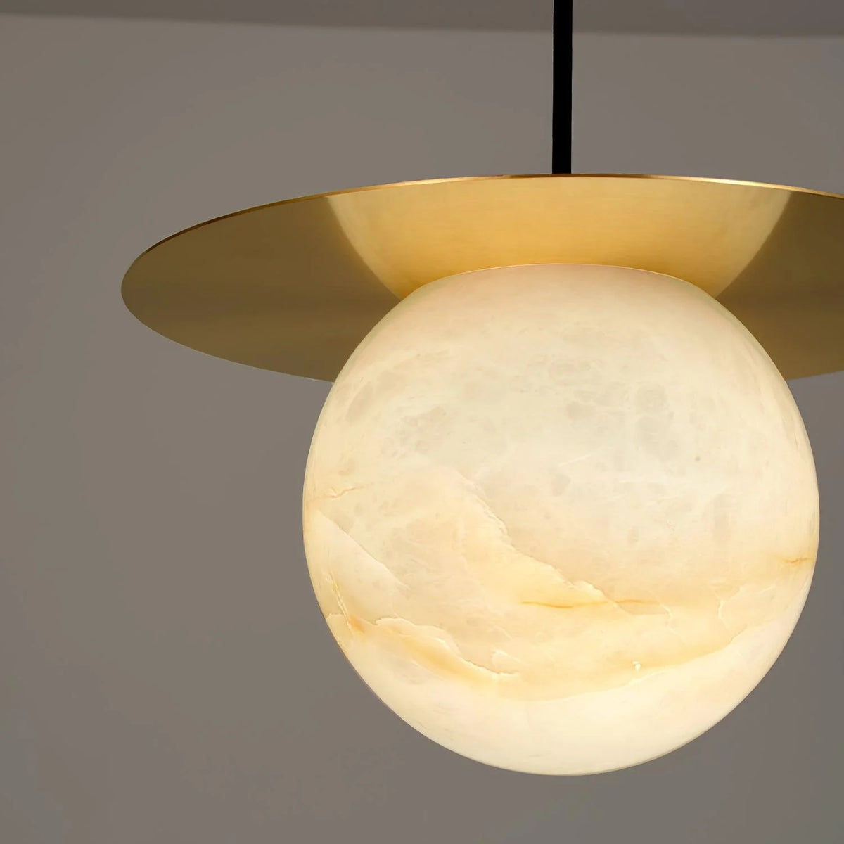 Modern Borra pendant light stylish gold plate beneath ball ceiling light