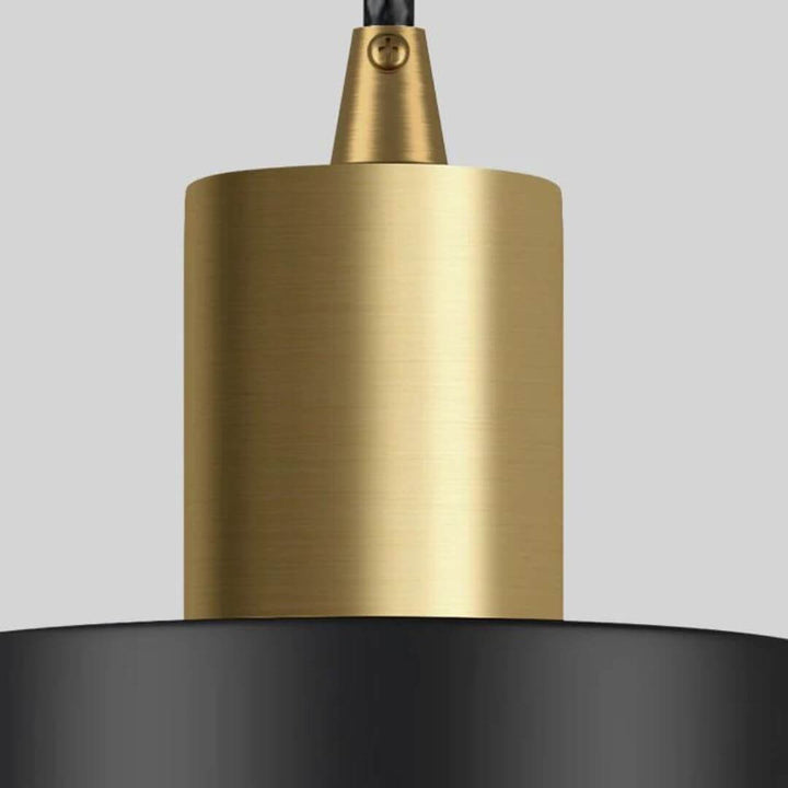 Close-up of Brilliance chandelier’s round metal mount base with sleek glass and modern design details