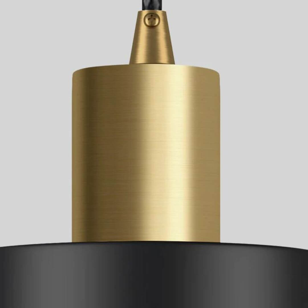 Close-up of Brilliance chandelier’s round metal mount base with sleek glass and modern design details