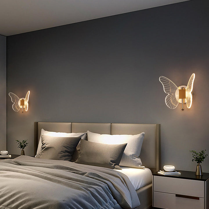 Butterfly LED bedside light installed beside bed in hallway, emitting soft warm light with modern aesthetic