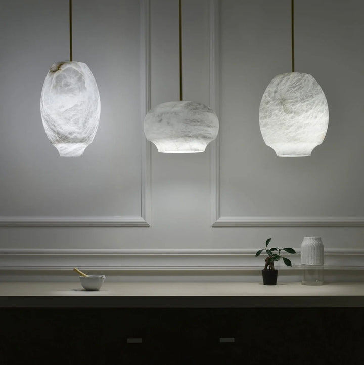 Camille alabaster pendant lamp three-size hanging view showcasing elegant modern lighting design