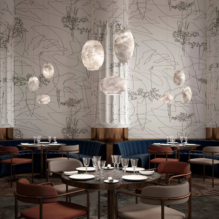Camille alabaster pendant lamp hanging in restaurant view with elegant modern lighting design