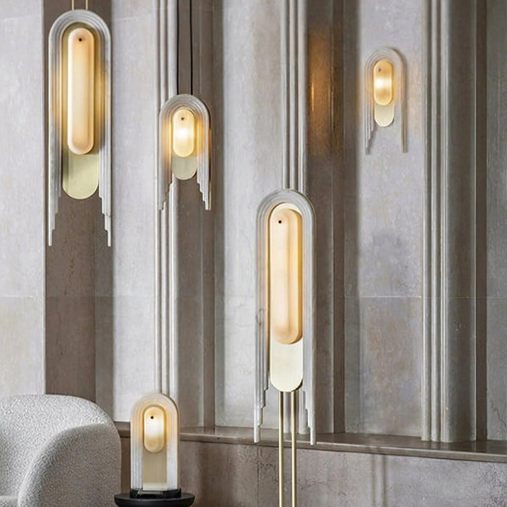 Cascada wall sconce full view showing all sizes with alabaster shades and gold metal accents