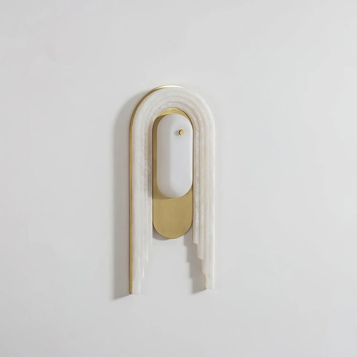 Cascada wall sconce side view highlighting alabaster shade and gold metal details, modern lighting