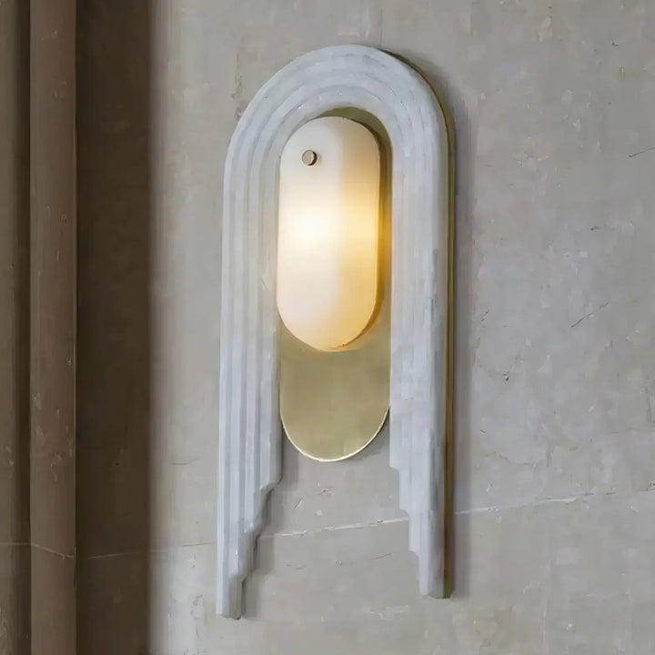 Cascada wall sconce side angle view with alabaster shade and gold metal accents, elegant lighting