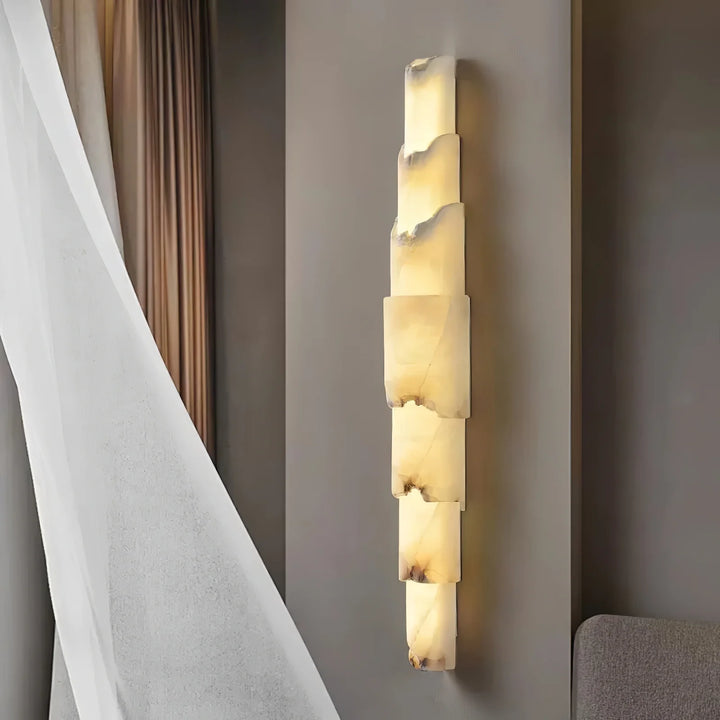 Cascading alabaster wall sconce luxury lighting showing a side view for elegant contemporary interiors