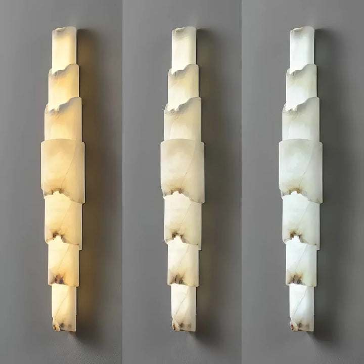 Cascading alabaster wall sconce luxury lighting with a front view showing three light colors for elegant interiors
