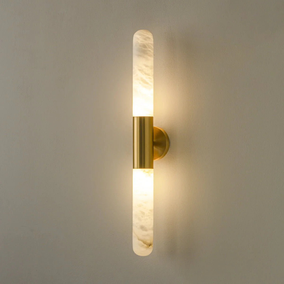 Side view of Cavoya Alabaster Wall Light with golden mount, luxury lighting, elegant home décor